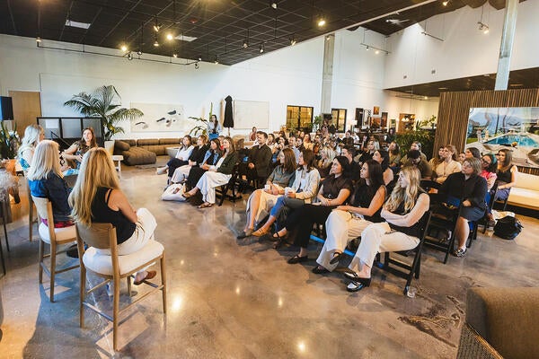 The live audience got a first look at—and listen to—the recording of the popular “Ask Us Anything” podcast